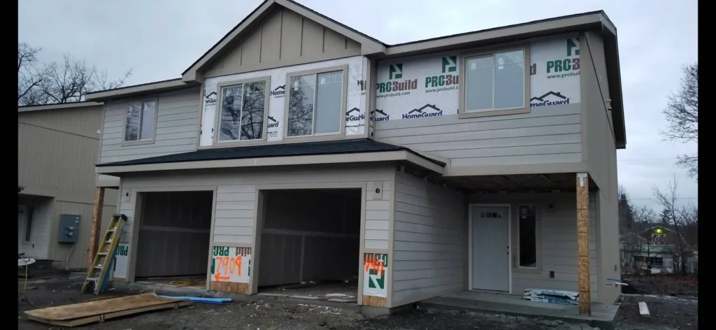 Install siding for Duplex